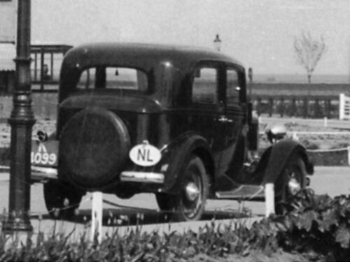 K-4099, Fiat Balilla van J. Torbijn uit Goes, geparkeerd in de Burg. Elenbaasstraat te Kruiningen, ca. 1936.<br />Bron: collectie Sjaak v. Loo. <br />